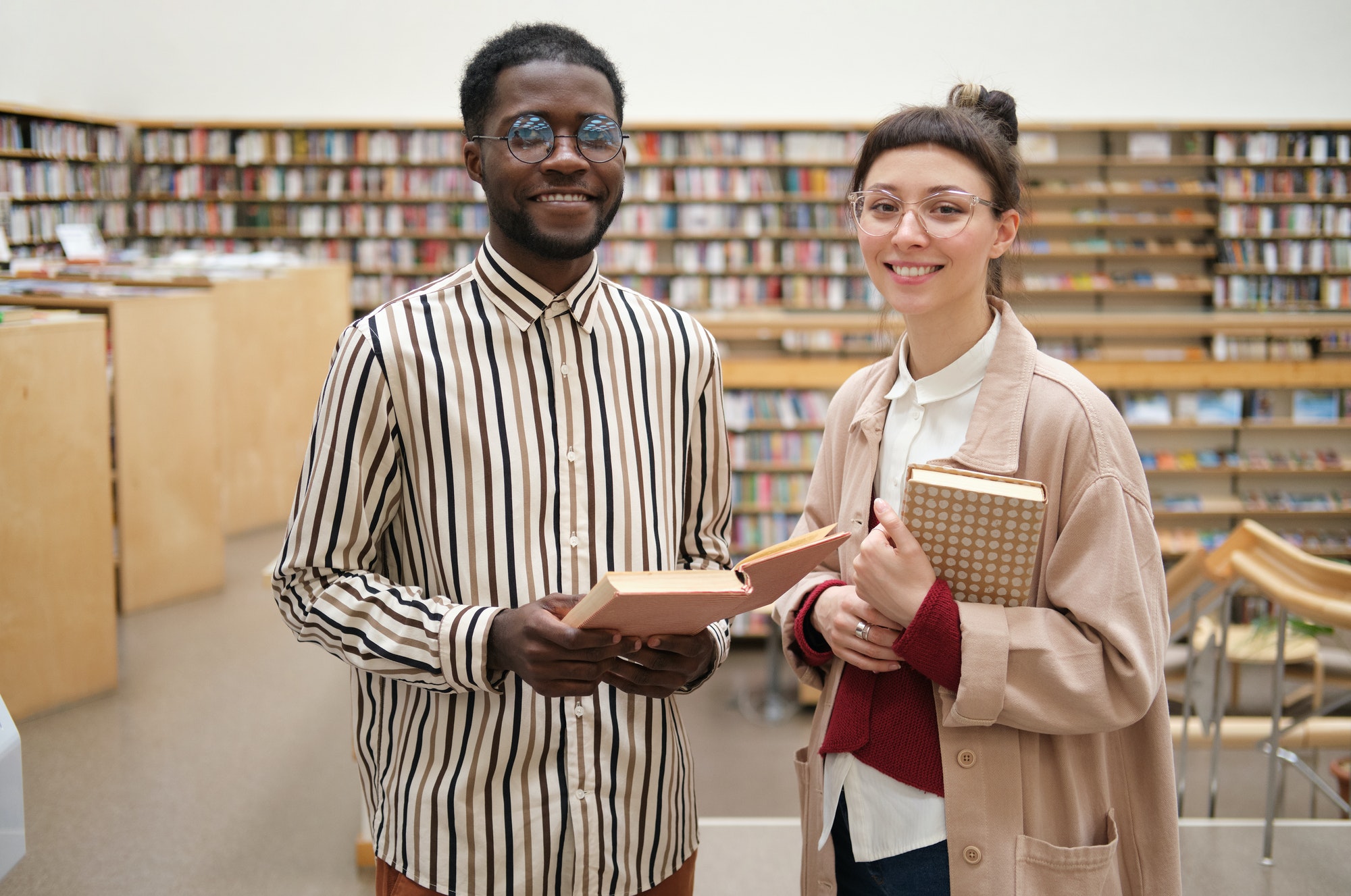 students standing in the library